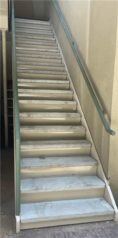 After metal staircase repair with restored and reinforced structure